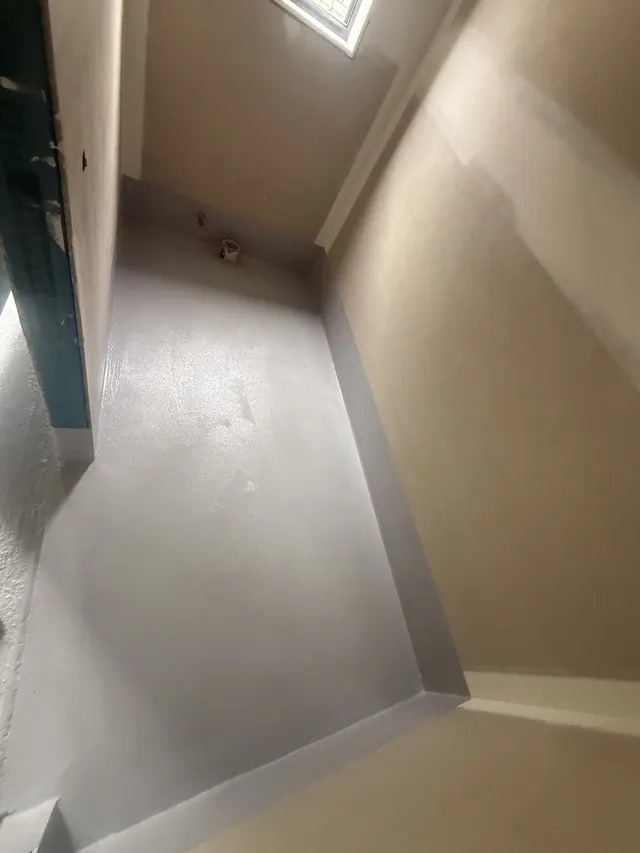 Ensuite floor membraned and turned up the walls