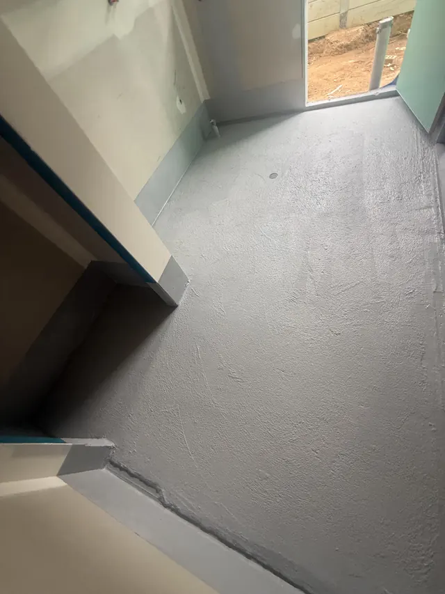 Wet area floor membraned through to the doorway