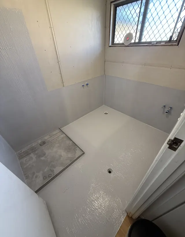 Bathroom floor and walls membraned with the shower base set